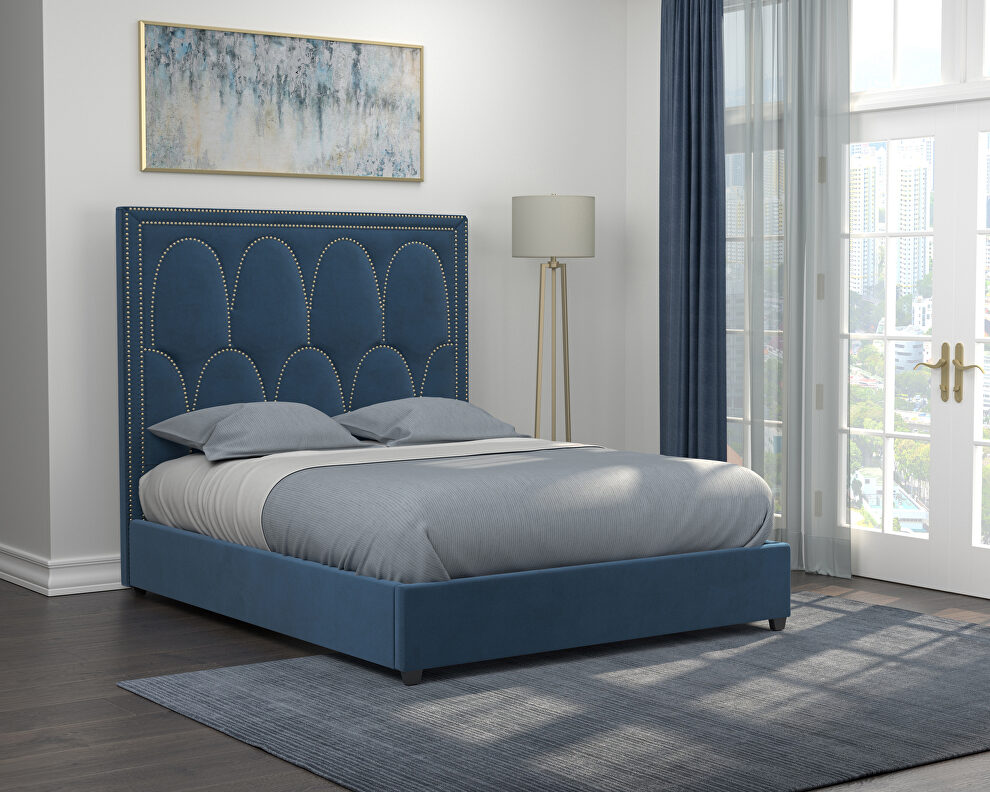 Queen bed upholstered in a rich blue velvet by Coaster