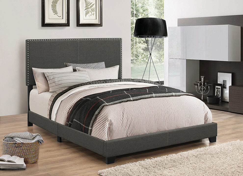 Upholstered charcoal king bed by Coaster