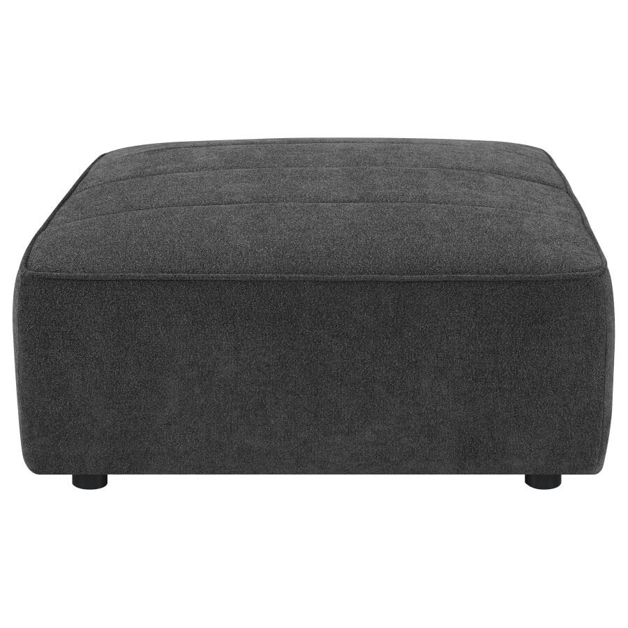 Upholstered square ottoman in dark charcoal fabric by Coaster