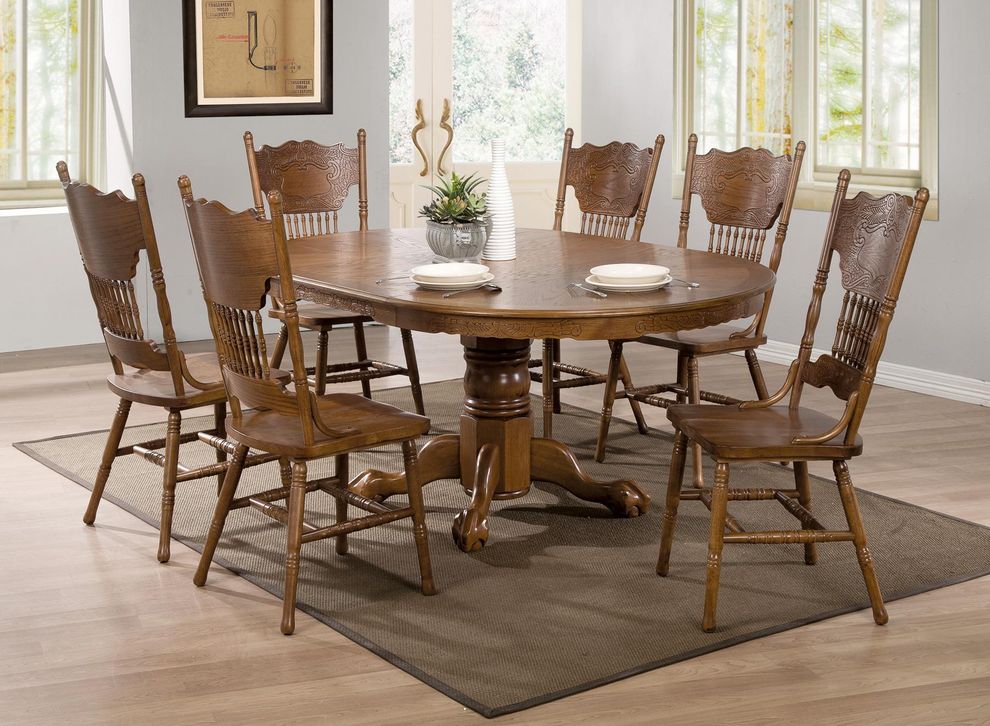 Round/Oval dining table w/ single pedestal & decorative apron by Coaster