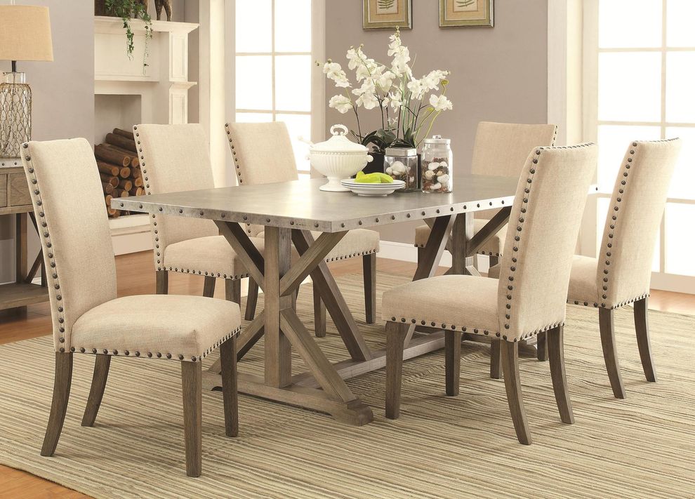 Rustic nailhead trim dining table by Coaster