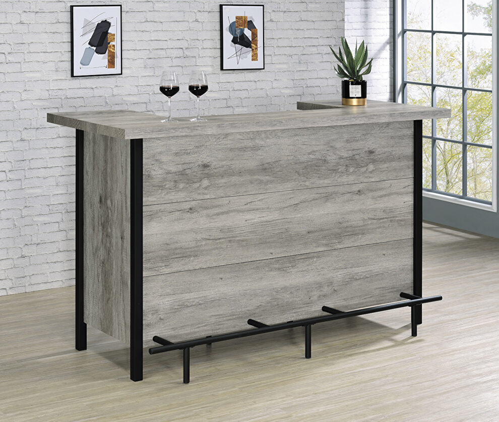 Gray driftwood finish bar unit with footrest by Coaster