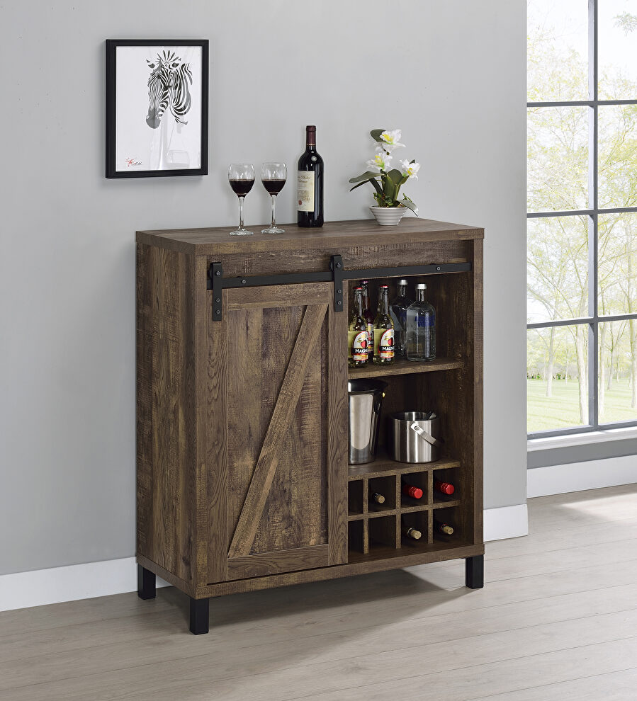 Rustic, farmhouse bar cabinet with sliding barn door by Coaster