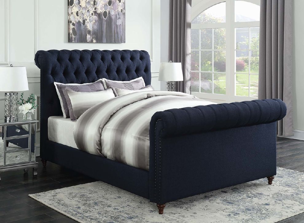 Navy blue upholstered queen bed by Coaster