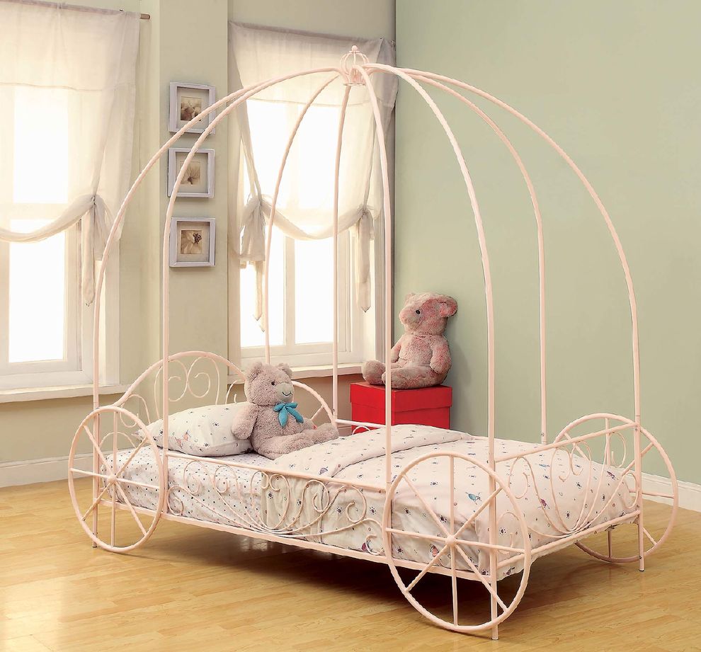 Pink twin canopy bed for a girl by Coaster