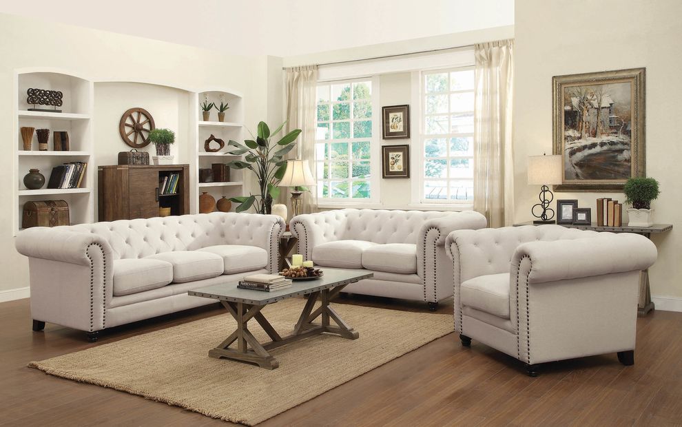 Traditional button tufted sofa w/ rolled back/arms by Coaster