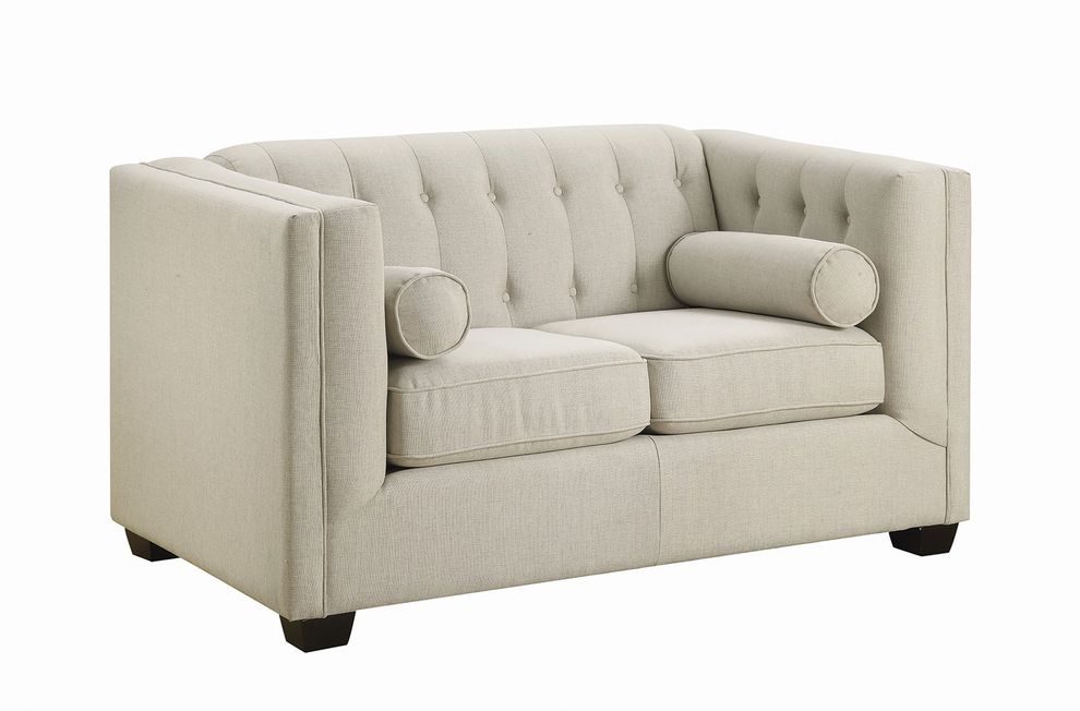 Tufted button design beige fabric loveseat by Coaster