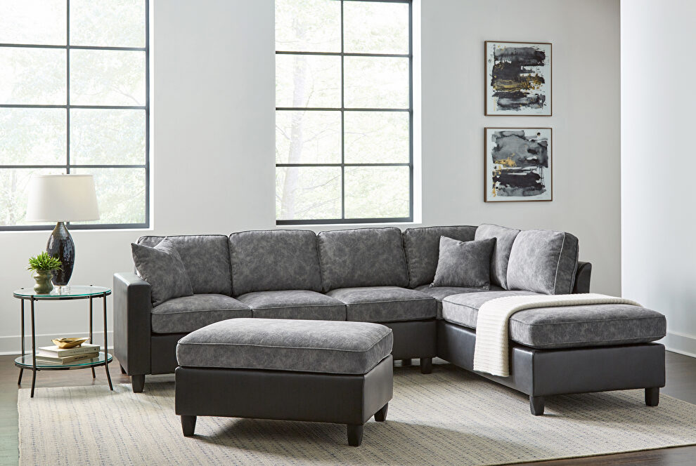 Versatile two piece sectional black leatherette frames the plush distressed velvet by Coaster