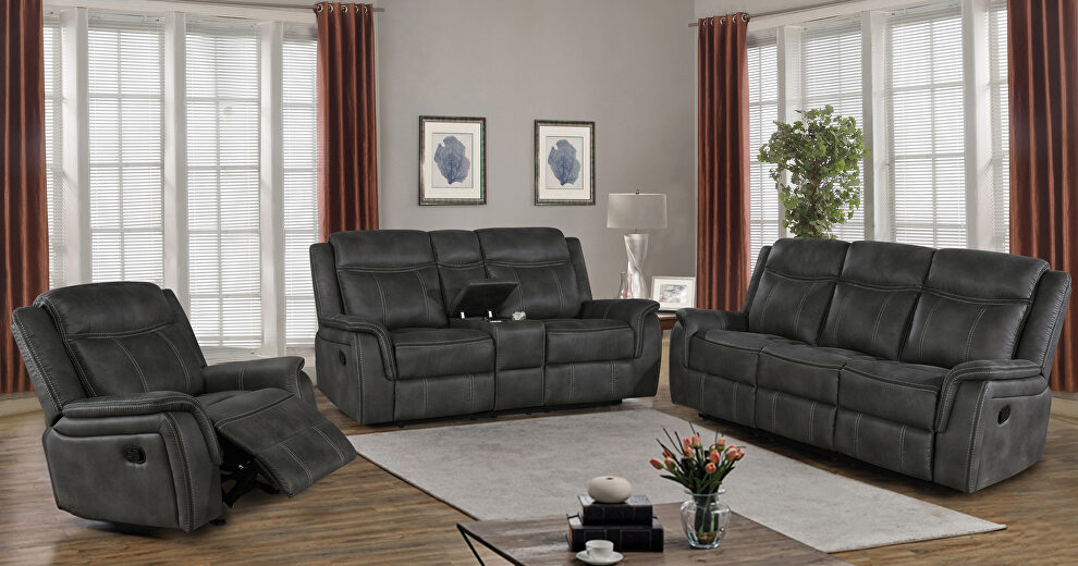 Motion sofa upholstered in charcoal performancegrade coated microfiber by Coaster