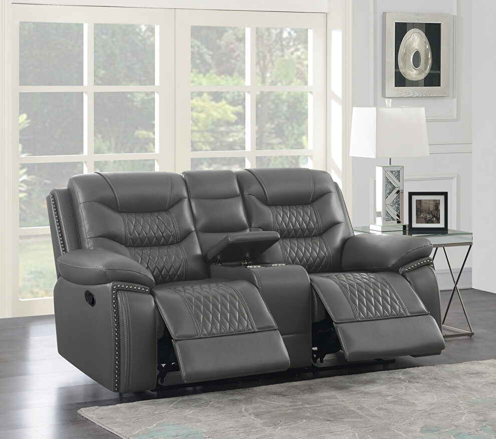 Motion loveseat upholstered in gray performance-grade leatherette by Coaster