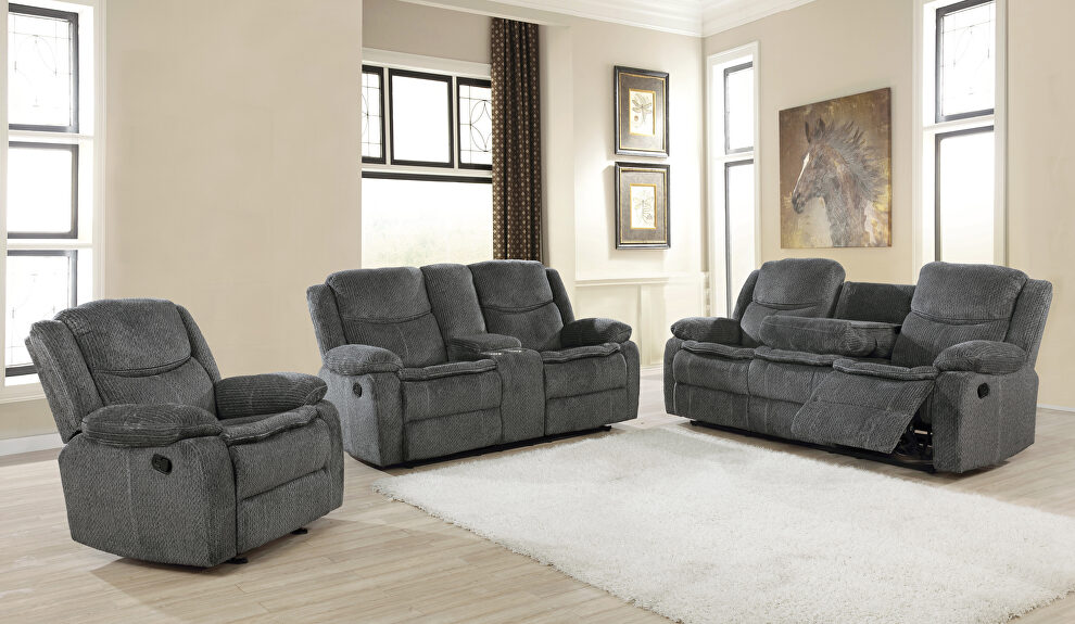 Motion sofa upholstered in charcoal performance-grade chenille by Coaster