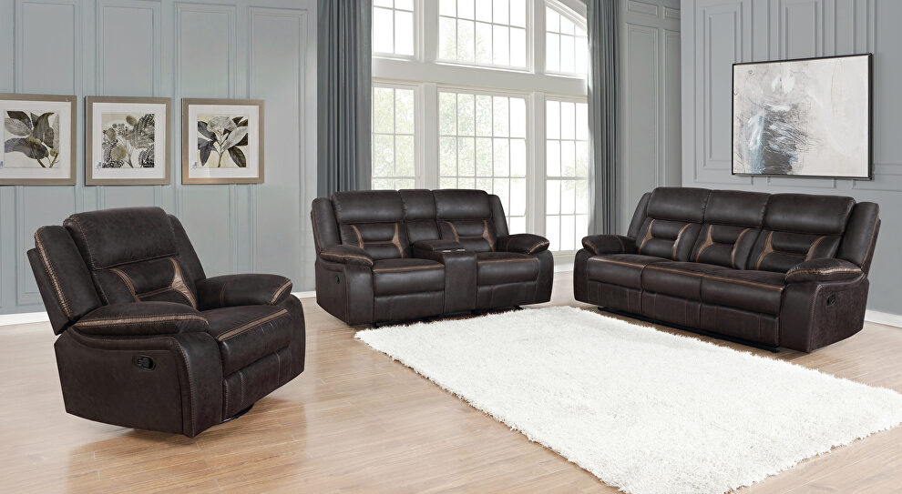 Motion sofa upholstered in dark brown performance-grade leatherette by Coaster
