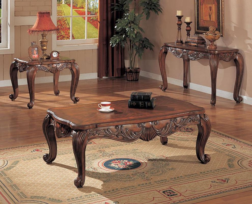 Brown wood carving base coffee table by Coaster