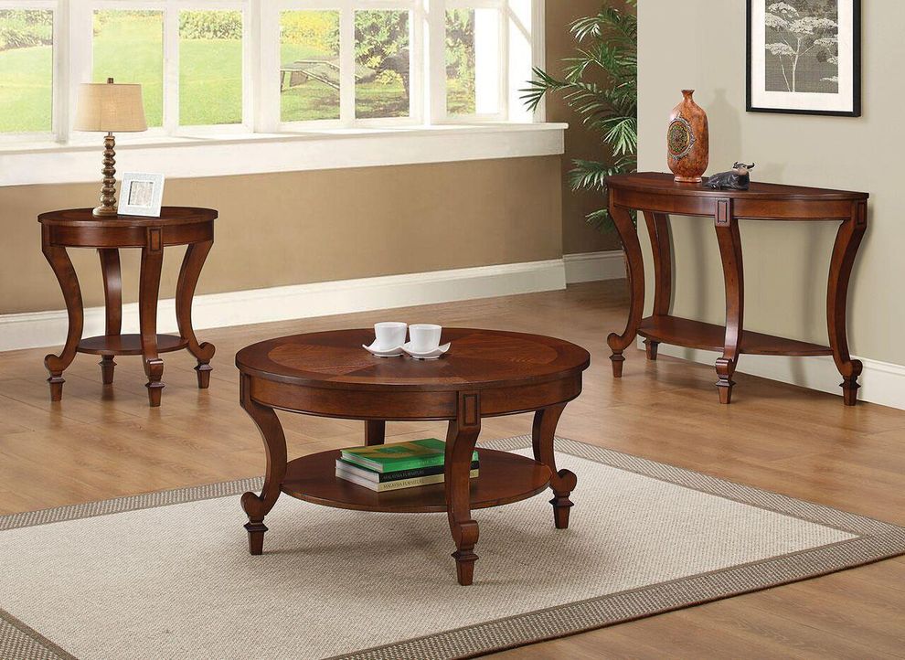 Warm brown round top coffee table by Coaster
