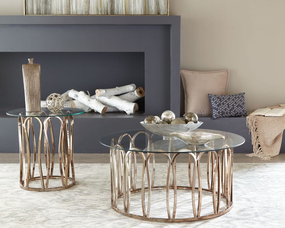 Round glass top / brass base coffee table by Coaster
