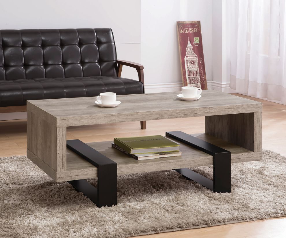 Gray driftwood / black sleek coffee table by Coaster