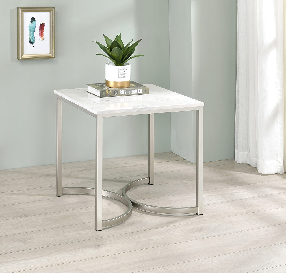 Sturdy steel base electroplated in a satin nickel finish end table by Coaster