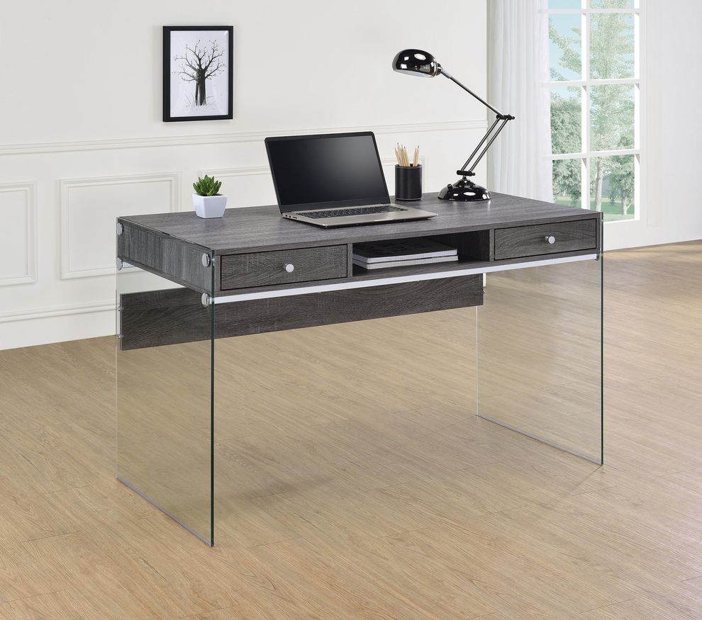 Contemporary weathered grey writing desk w/ glass legs by Coaster