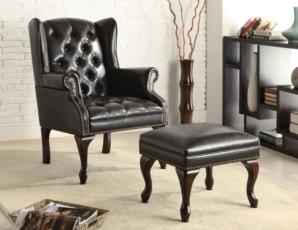 Wing chair with ottoman in dark brown vinyl by Coaster