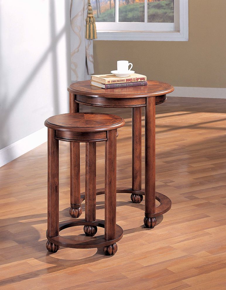 Traditional warm amber nesting table by Coaster
