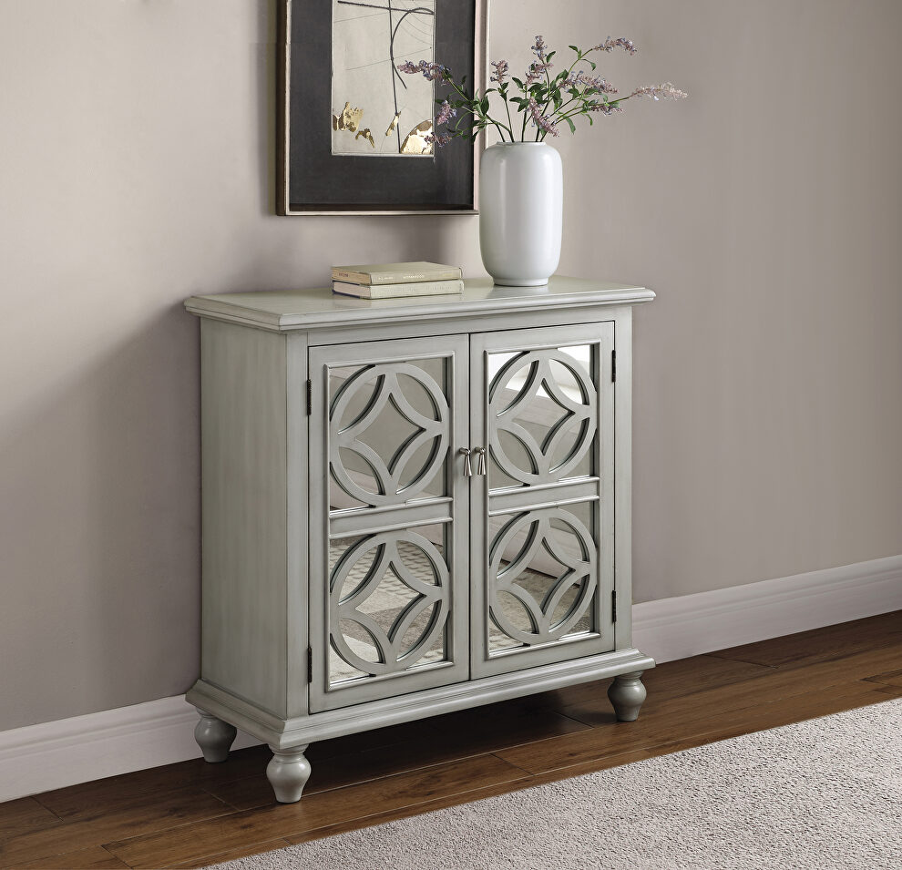 Solid hardwood with mirrored door panels accent cabinet by Coaster