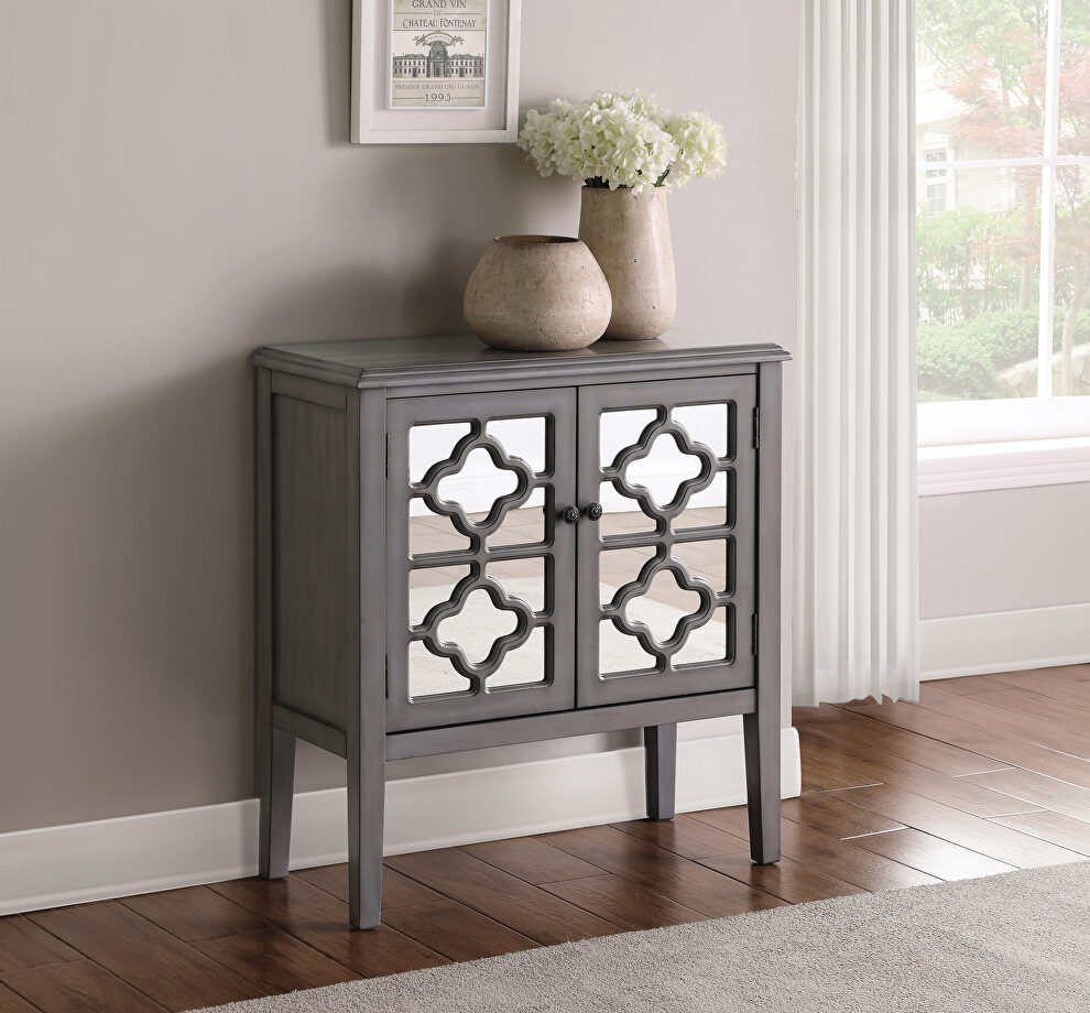 Solid hardwood frame with mirrored door panels accent cabinet by Coaster