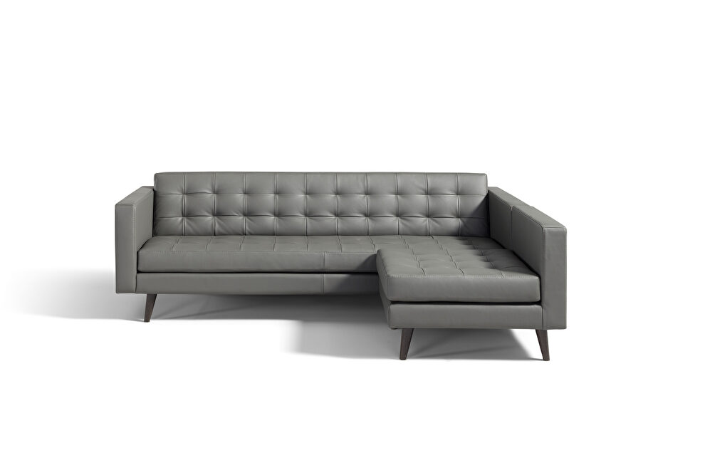 Contemporary tufted sectional sofa in dark gray leather by Diven Living