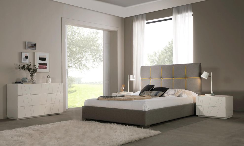 Modern gray/yellow tufted headboard king bed by Dupen Spain