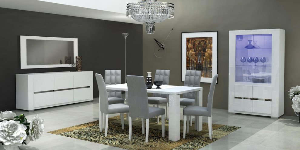 Ultra modern white high-gloss family dining table by Status Italy