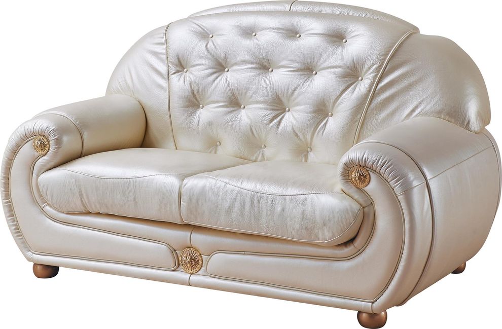 Full beige leather loveseat in classic tufted design by ESF