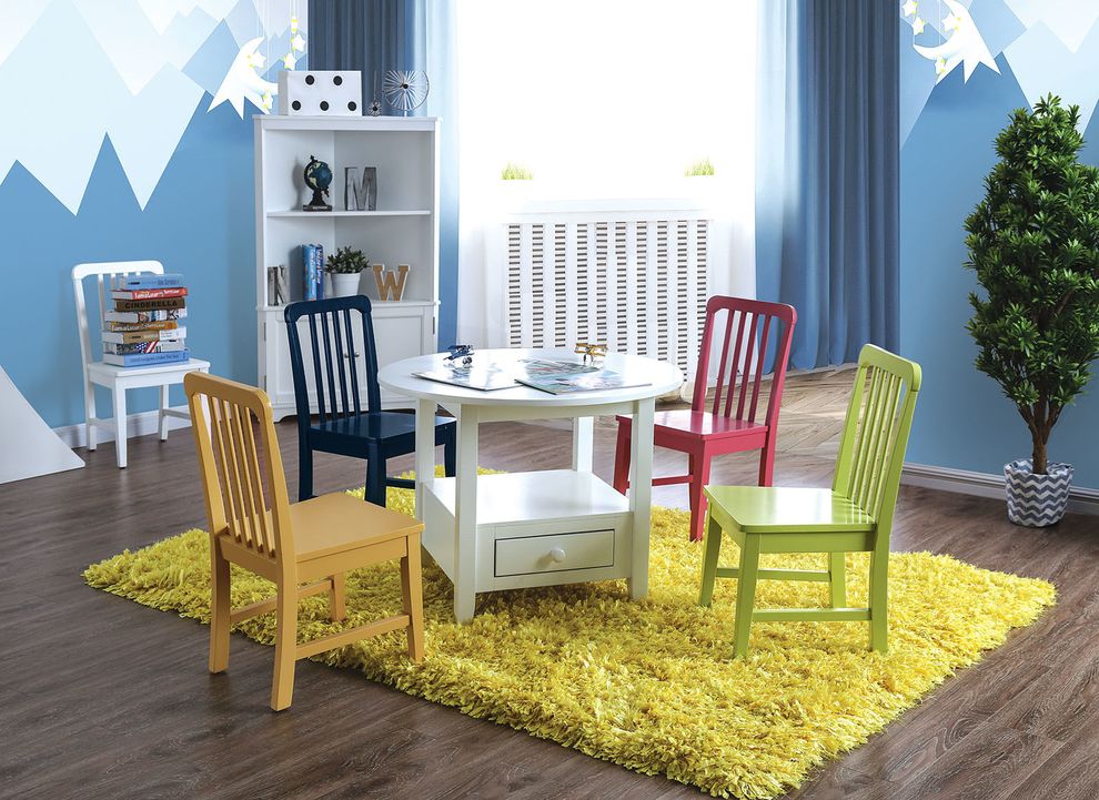 Round kids table set with multicolor chairs by Furniture of America