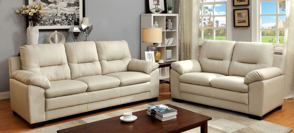 Ivory leatherette casual sofa in modern style by Furniture of America