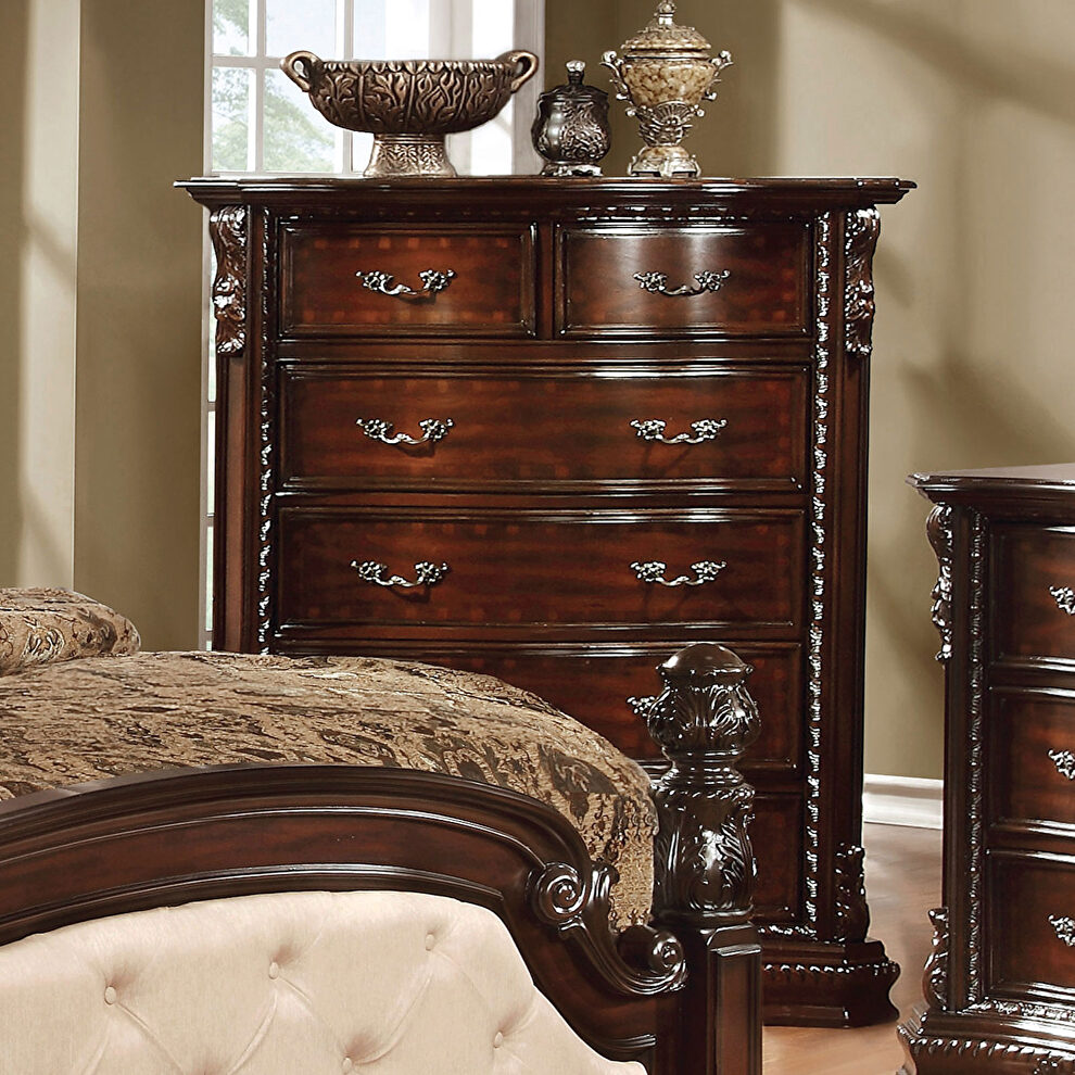 Brown cherry finish and antique brass handles chest by Furniture of America