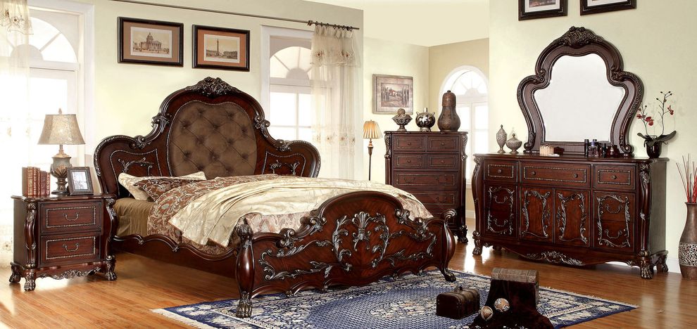 Cherry finish traditional king bed with carvings by Furniture of America
