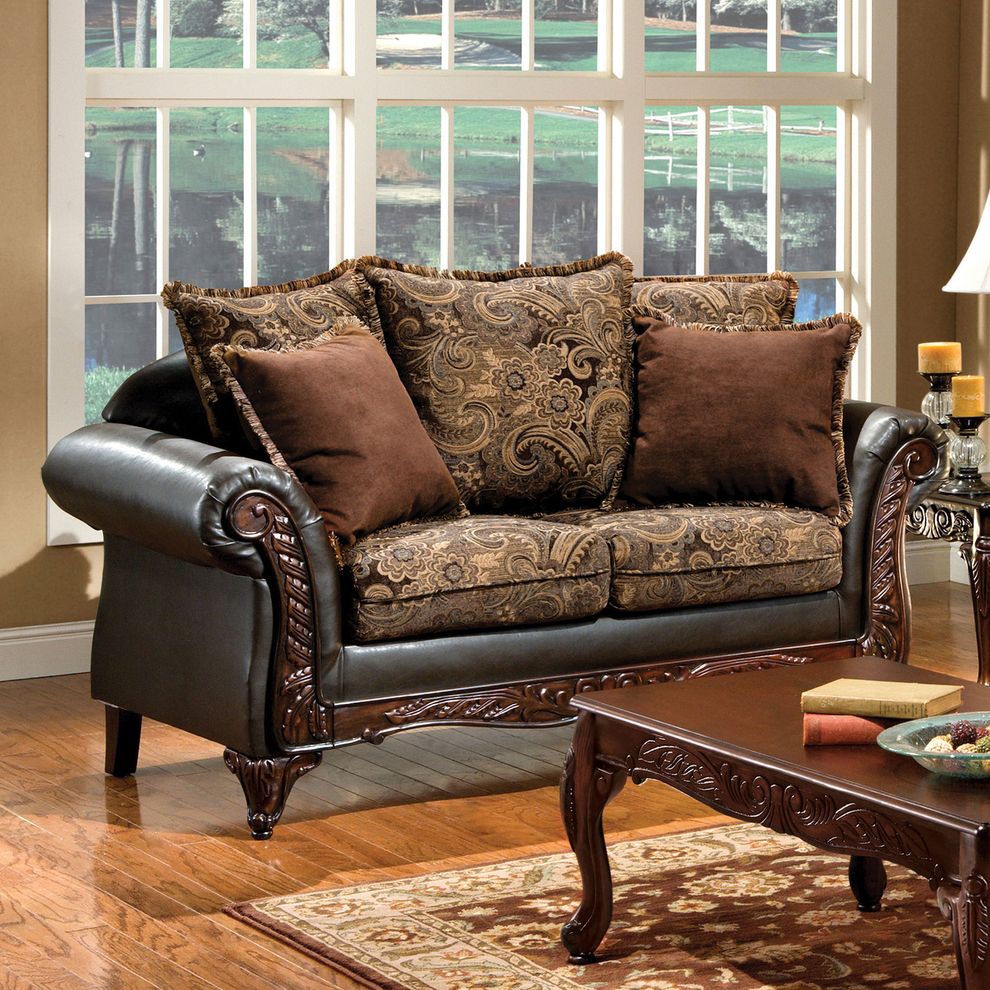 Classic floral fabric rolled arm style loveseat by Furniture of America