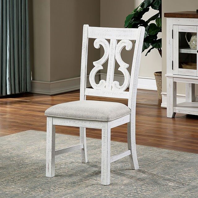 Decorative back rest and padded fabric seat dining chair by Furniture of America