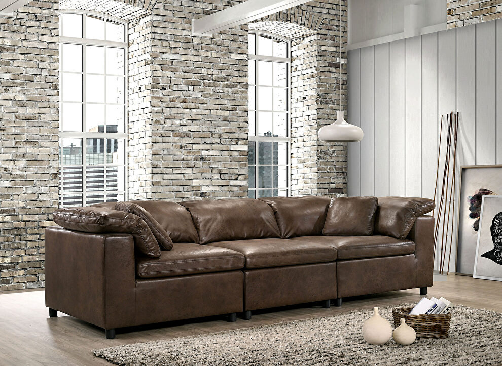 Modular design and neutral color faux leather sofa by Furniture of America