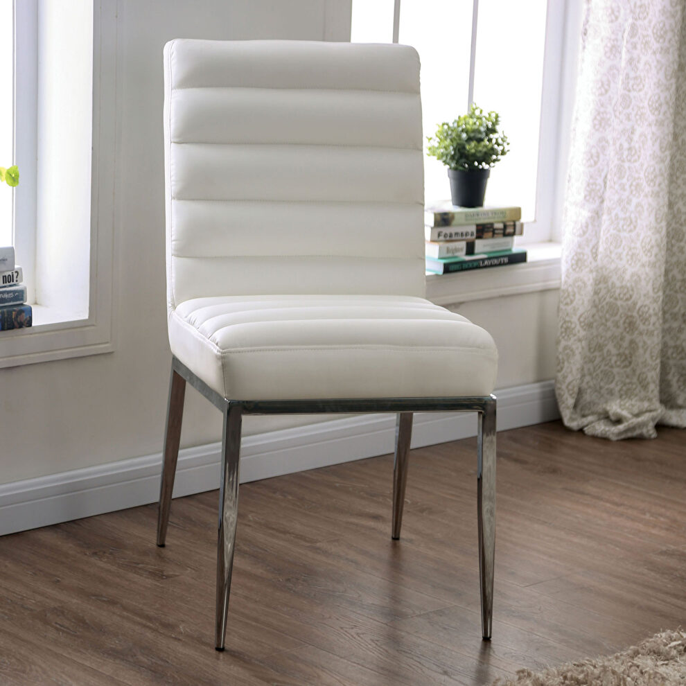 Plush cushioned white faux leather dining chair by Furniture of America