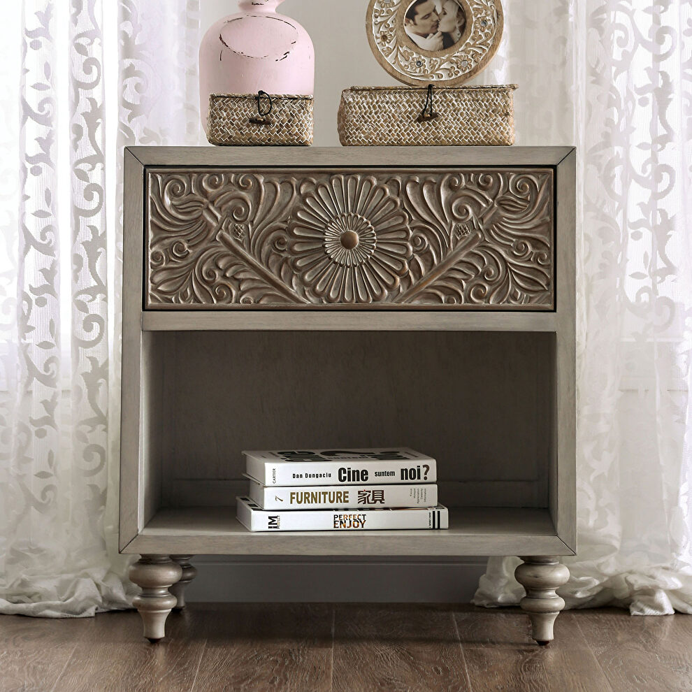 Beige polyresin floral design nightstand by Furniture of America