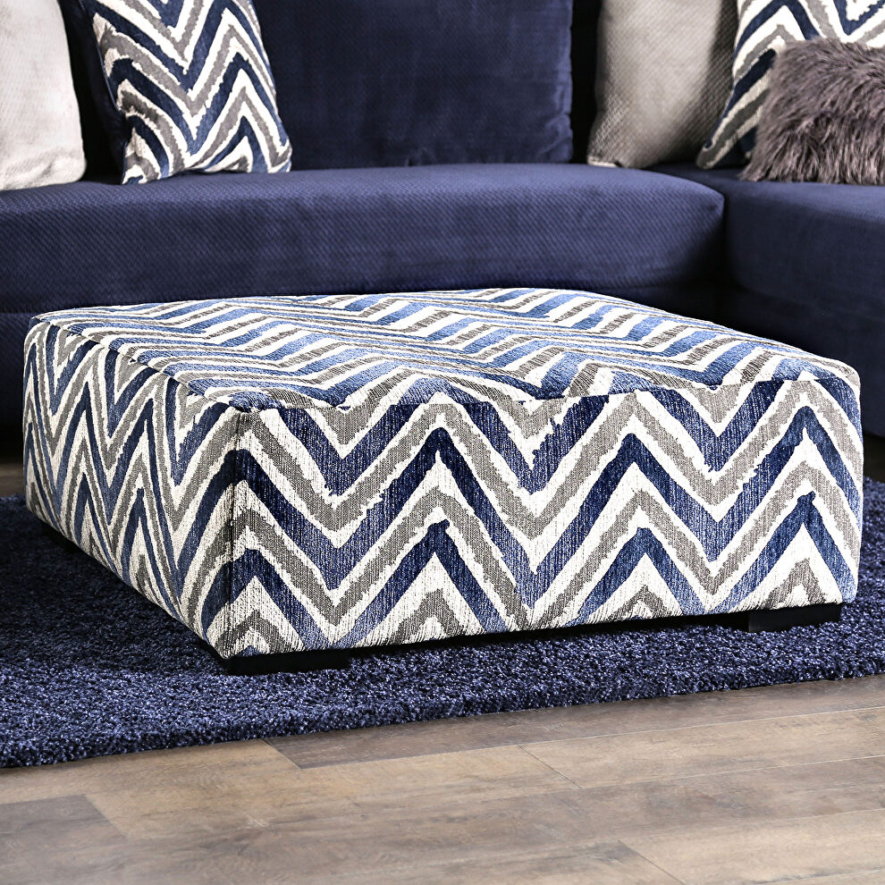 Large-print 'z' pattern accents contrasting ottoman by Furniture of America
