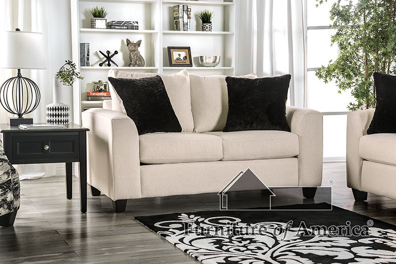 Ivory upholstery and black throw pillows loveseat by Furniture of America