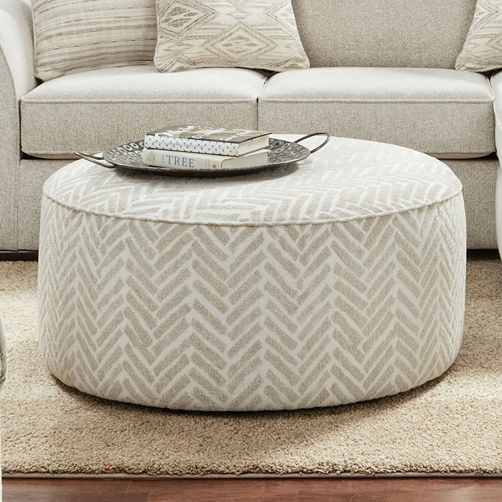 Broad, round, firm and soft ottoman by Furniture of America
