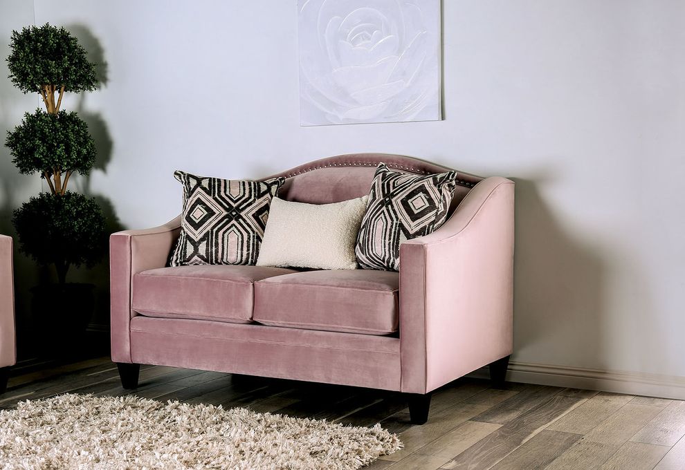 Blush pink velvet like fabric sloped arms loveseat by Furniture of America