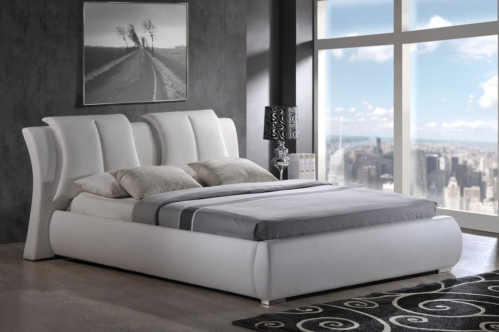 Casual style white bed w/ unique pillow headboard by Global
