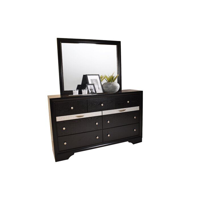 Clean midcentury lines and a black modern dresser by Galaxy