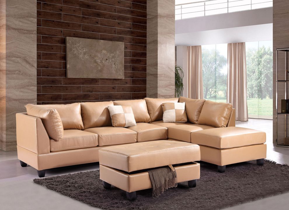 Tan bycast leather reversible sectional sofa by Glory
