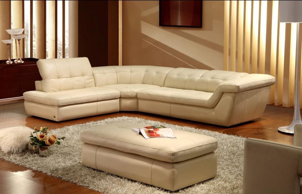 Italian beige leather tufted sectional sofa by J&M