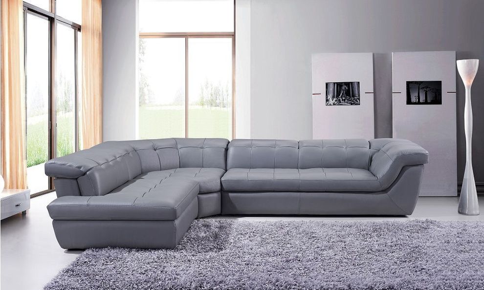 Italian gray leather tufted sectional sofa by J&M