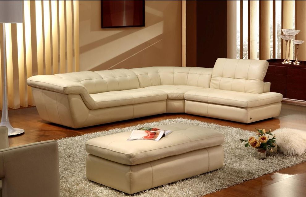 Italian beige leather tufted sectional sofa by J&M