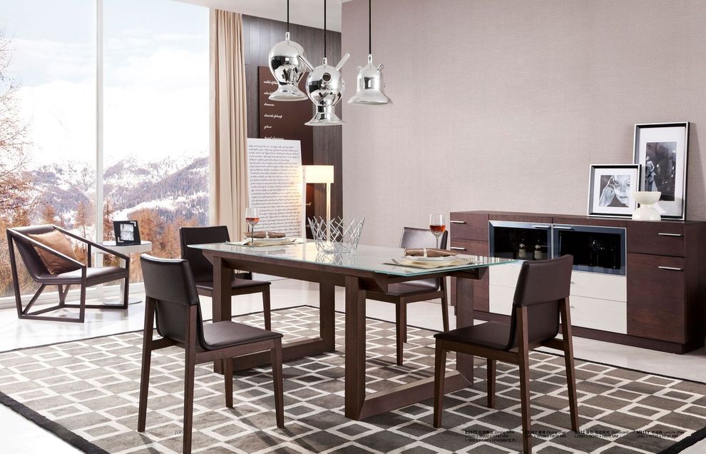 Walnut modern dining table in contemporary style by J&M
